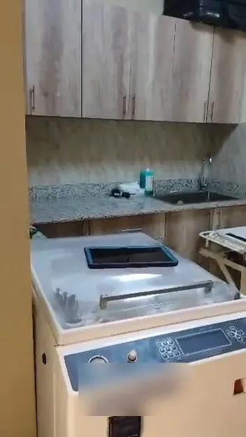 The old washer-disinfector in the room as the hospital sent it to us