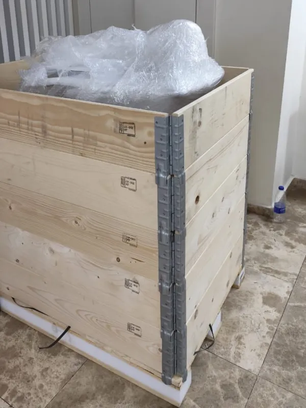 Wooden shipping crate holding the ultrasound equipment